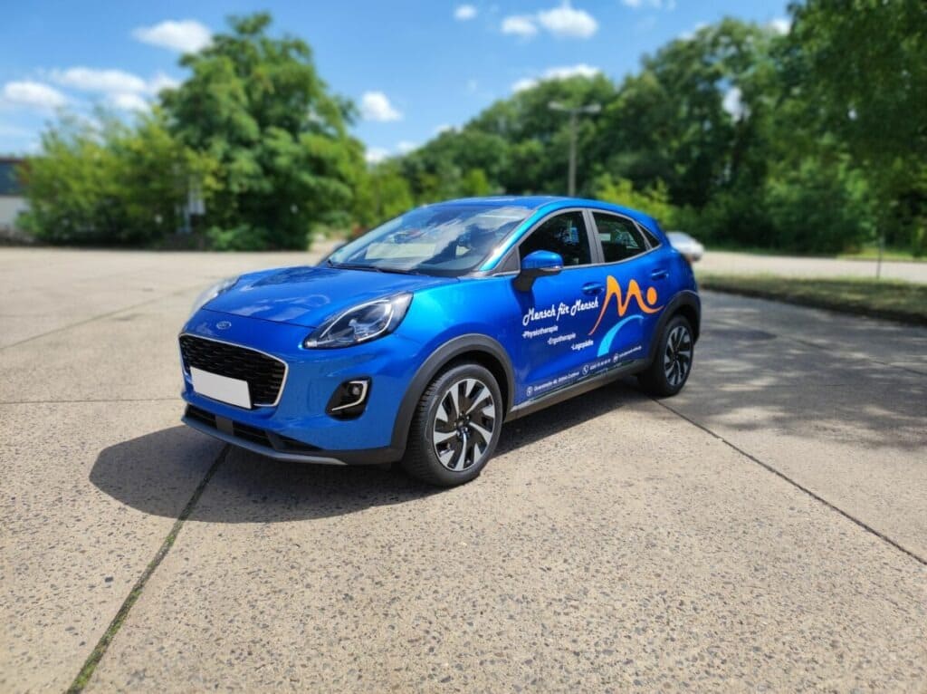Fahrzeugbeschriftung für Mensch für Mensch in Cottbus durch KLT-Werbung